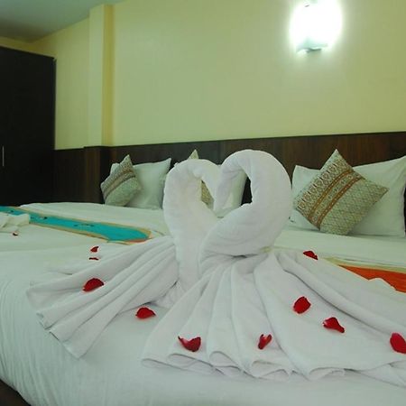 Patong Palm Guesthouse Værelse billede